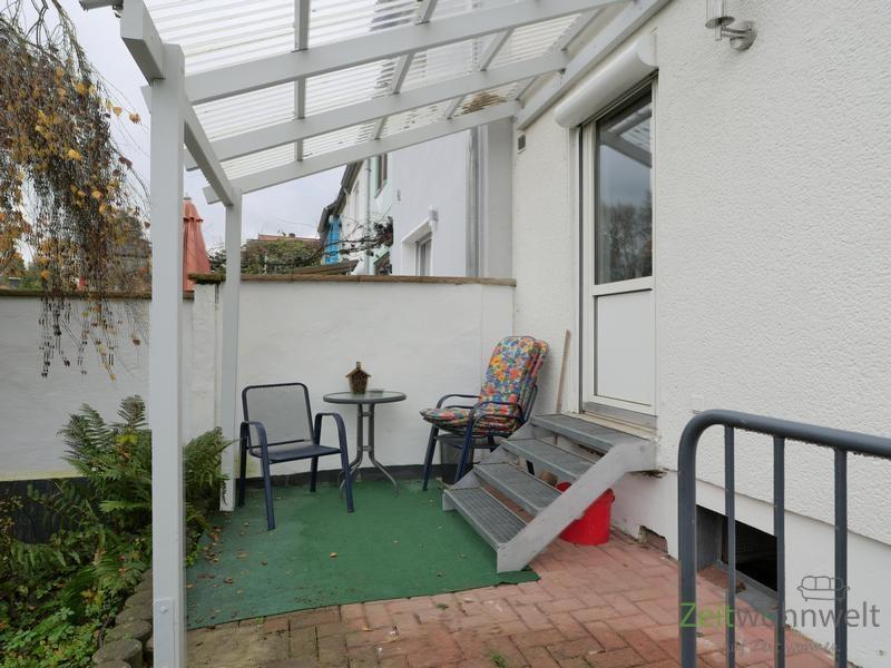 überdachter Sitzplatz vor der Küche