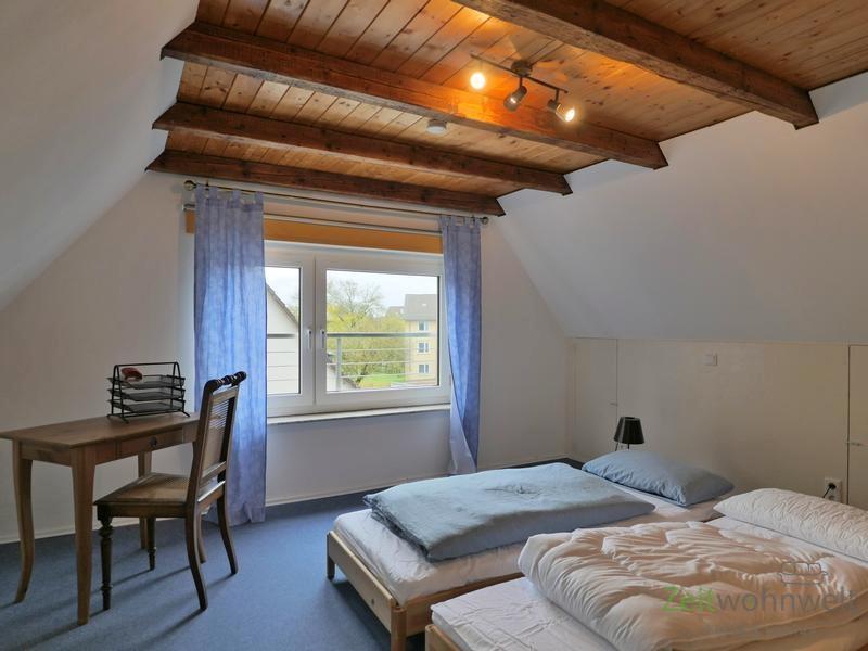 Dachzimmer moit Gästebetten