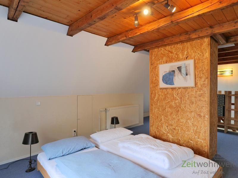 zwei Betten im Dach
