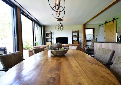 kaufen-freistehende-luxus-ferienvilla-baarle-nassau-wohnzimmer-essbereich-innenansicht-recreatieadviseurs-vakantiehuistekoop-nl.jpg