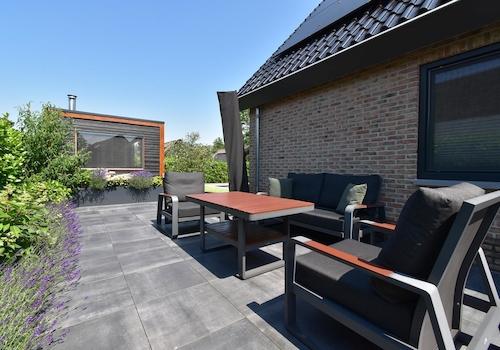 kaufen-freistehende-luxus-ferienvilla-baarle-nassau-sonnenterrasse-lounge-recreatieadviseurs-vakantiehuistekoop-nl.jpg