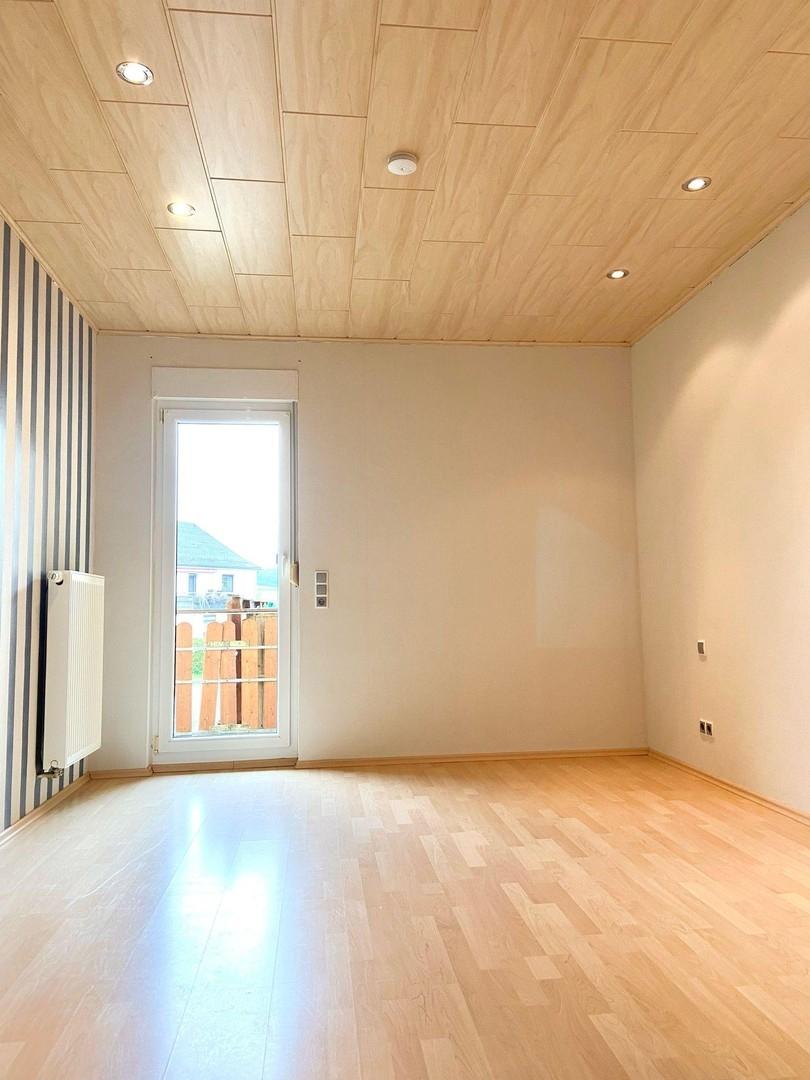 Schlafzimmer mit Balkonzugang