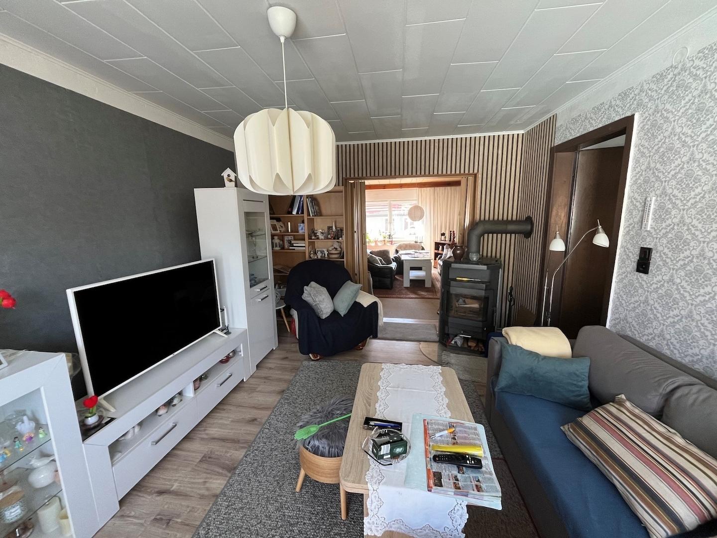 Wohnzimmer2_Blickrichtung_Wohnzimmer1_OG