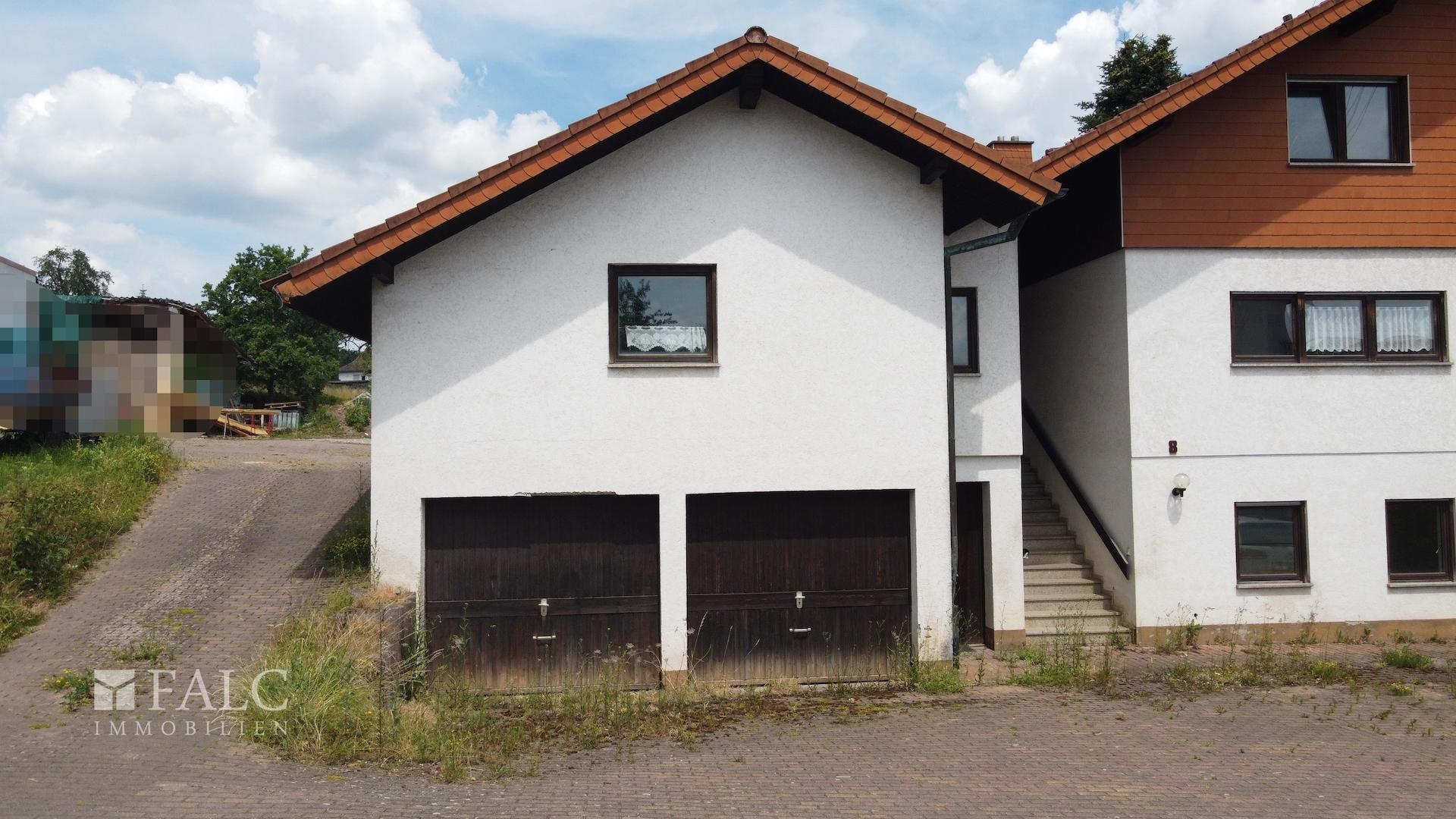 Doppelgarage mit Kellerzugang