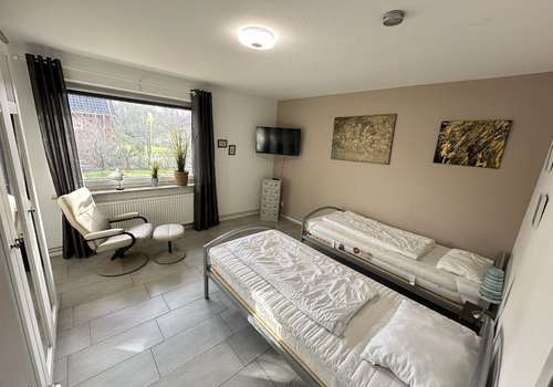 Schlafzimmer III im EG