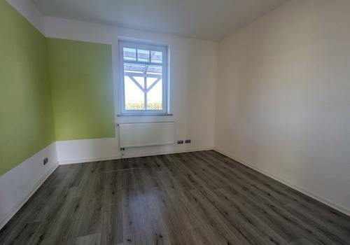 Schlafzimmer in Wohnung 2 im EG