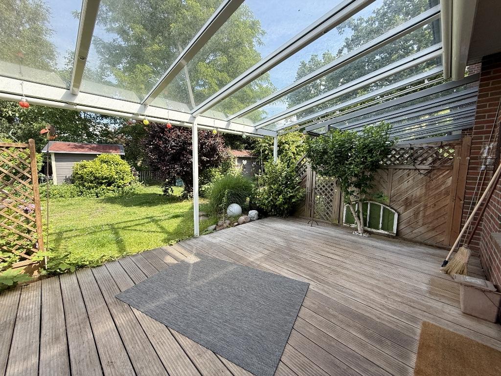mit Zugang zur überdachten Terrasse 