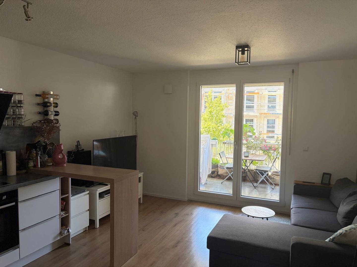 Wohnzimmer mit Küche