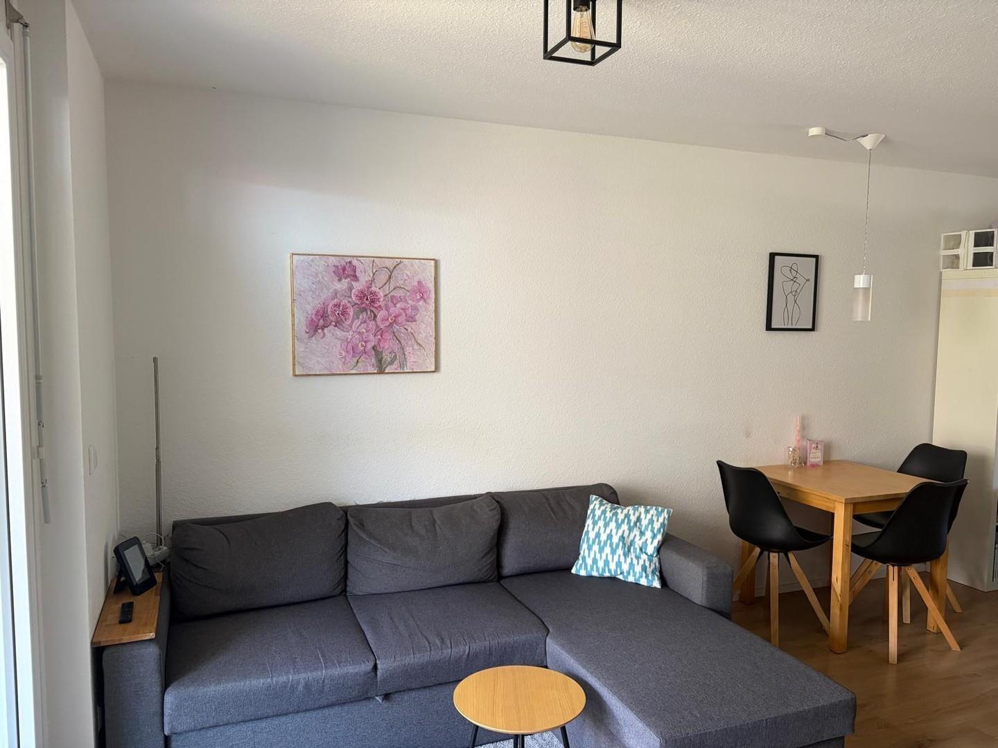 Wohnzimmer mit Küche