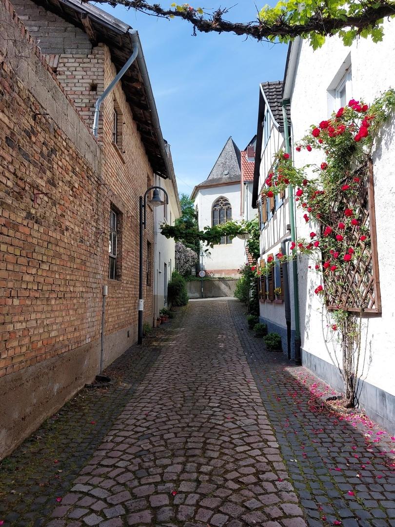 Gasse mit Hufschmiede 