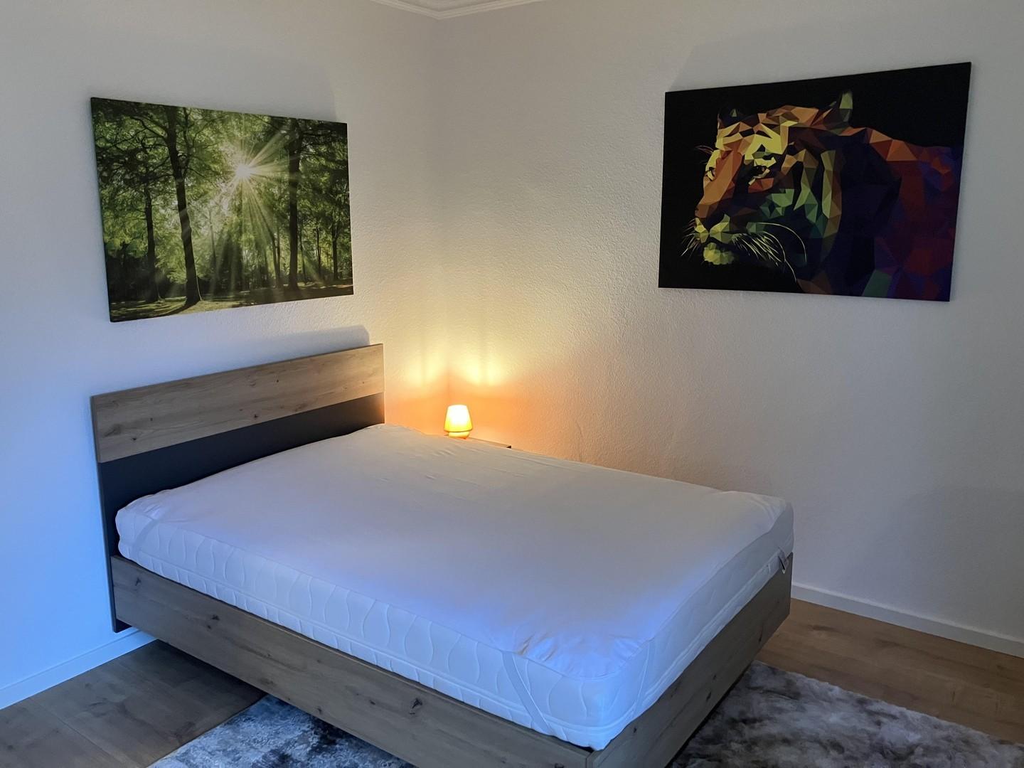 Bett in Zimmer #1