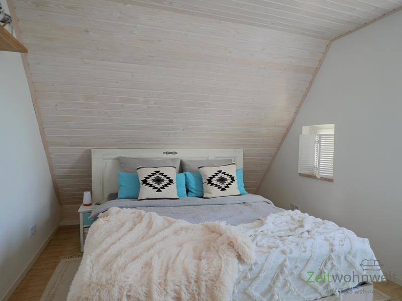 Doppelbett im Schlafzimmer