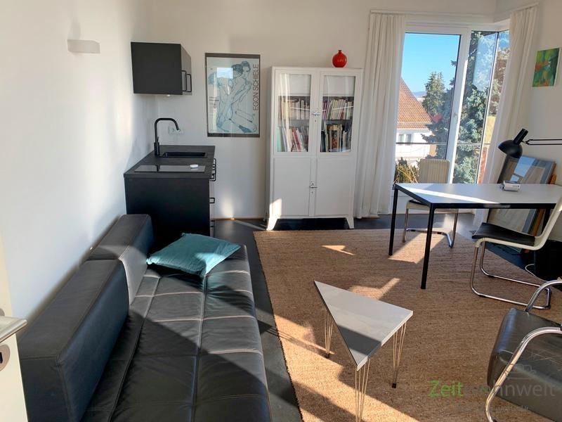 Wohnzimmer mit Küchenblock
