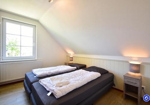 kaufen-freistehendes-ferienhaus-cochem-fuenftes-schlafzimmer-boxspringbetten-recreatieadviseurs-vakantiehuistekoop-nl.jpg