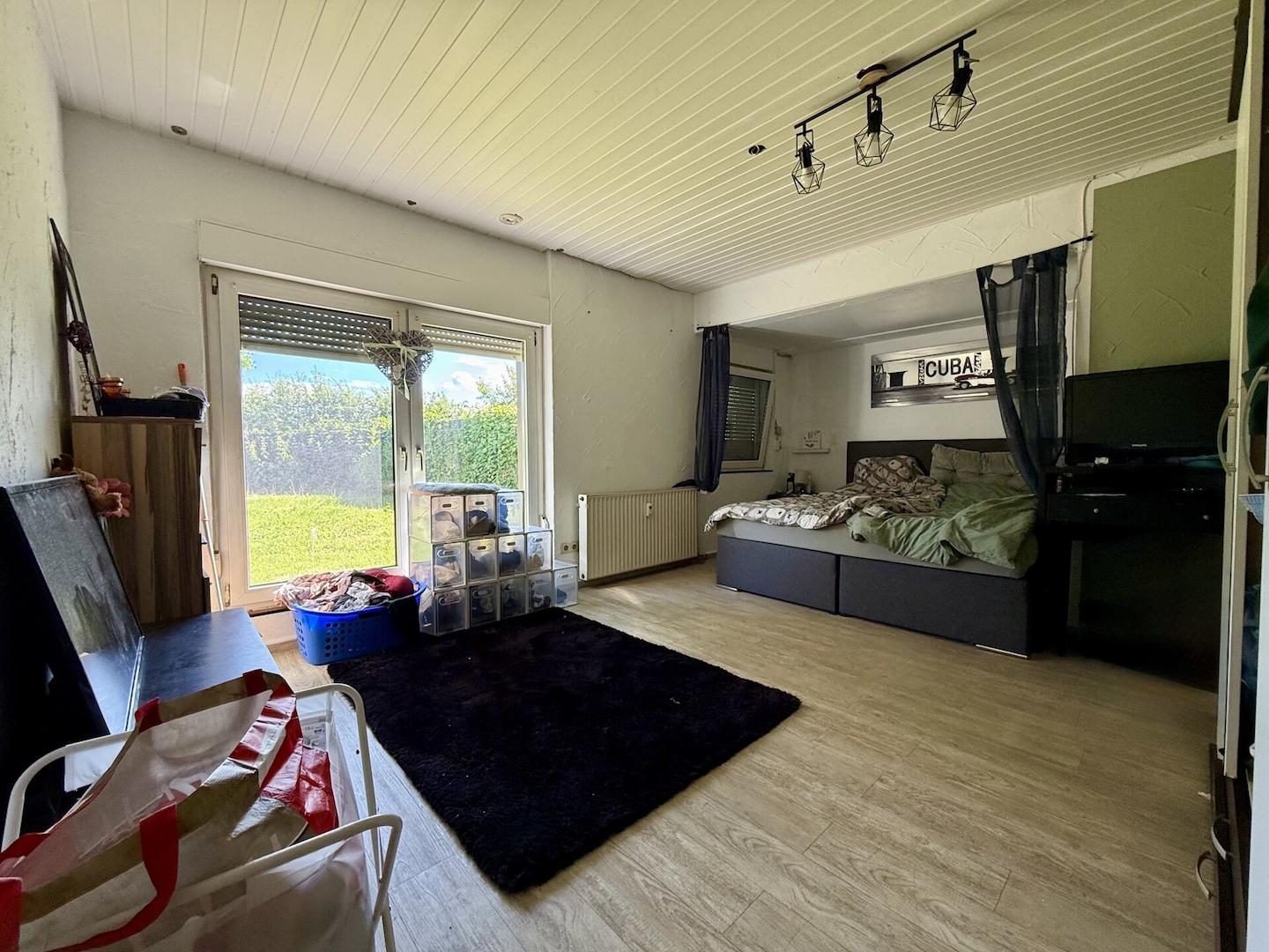 Wohnung 1: Schlafzimmer