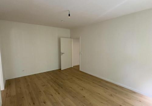 Wohnzimmer – Blick zum Eingang