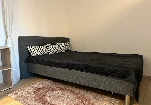 Schlafbereich mit Doppelbett