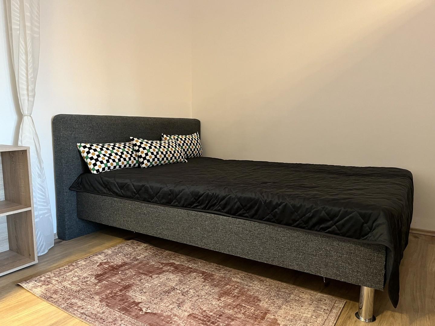 Schlafbereich mit Doppelbett