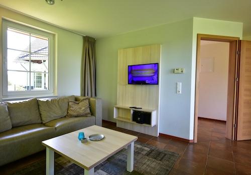 kaufen-freistehendes-ferienhaus-cochem-wohnzimmer-und-tageslicht-recreatieadviseurs-vakantiehuistekoop-nl.jpg2