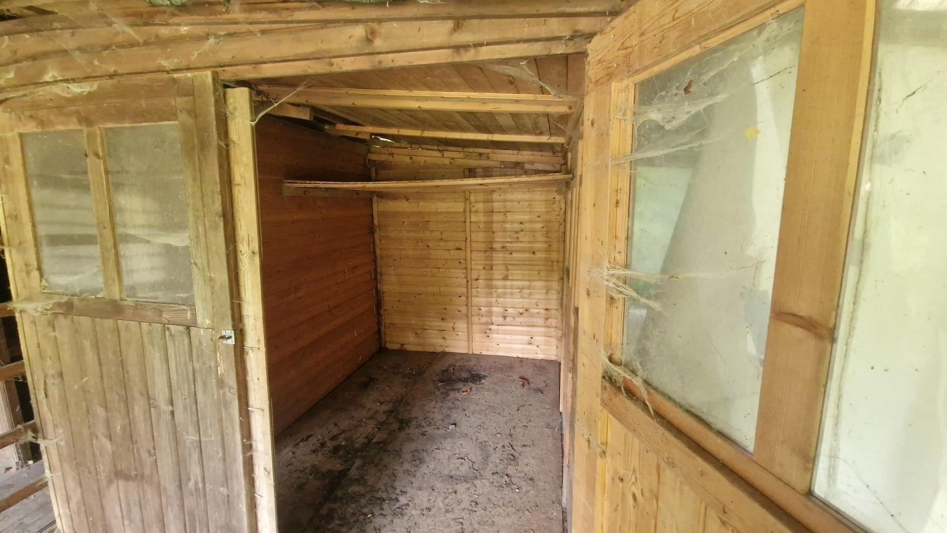 Holzhaus für Gartengeräte