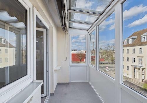 Verglaster Balkon