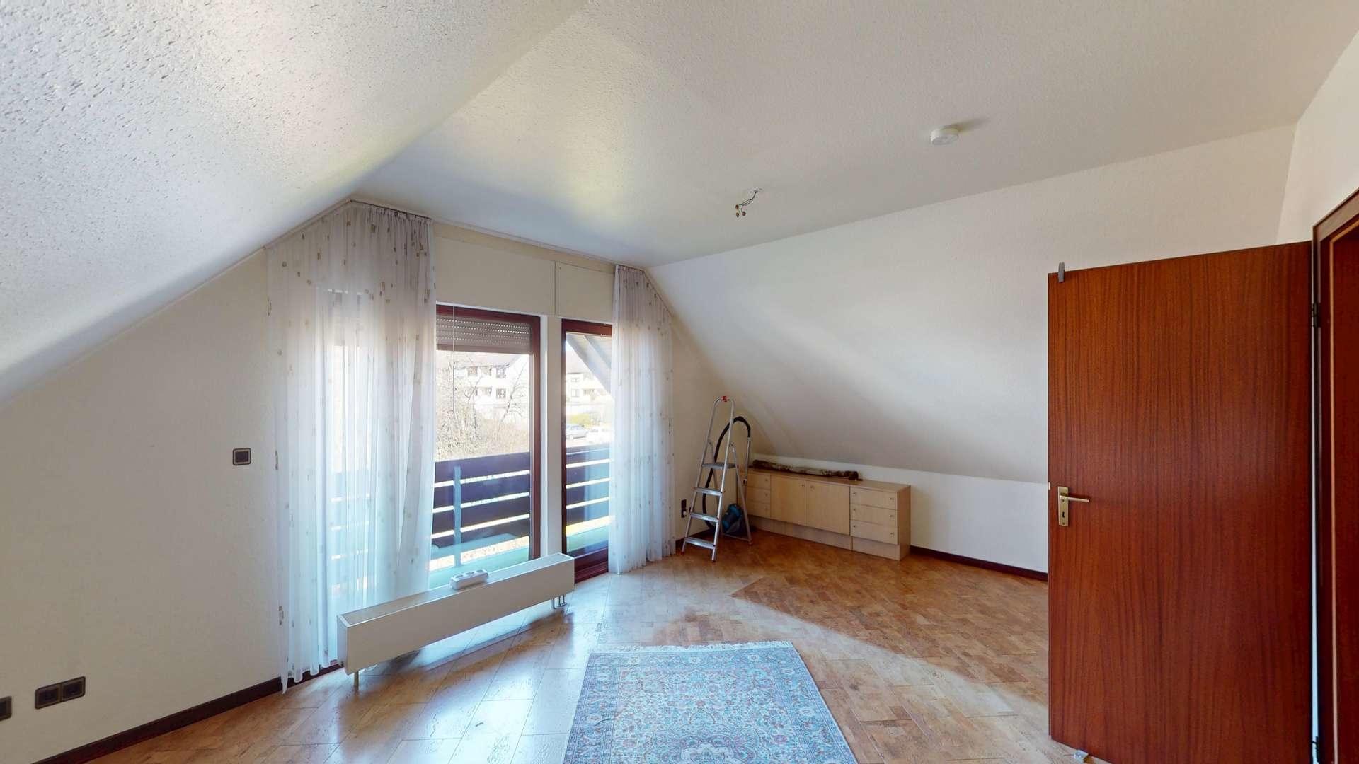 Schlafzimmer mit Balkon