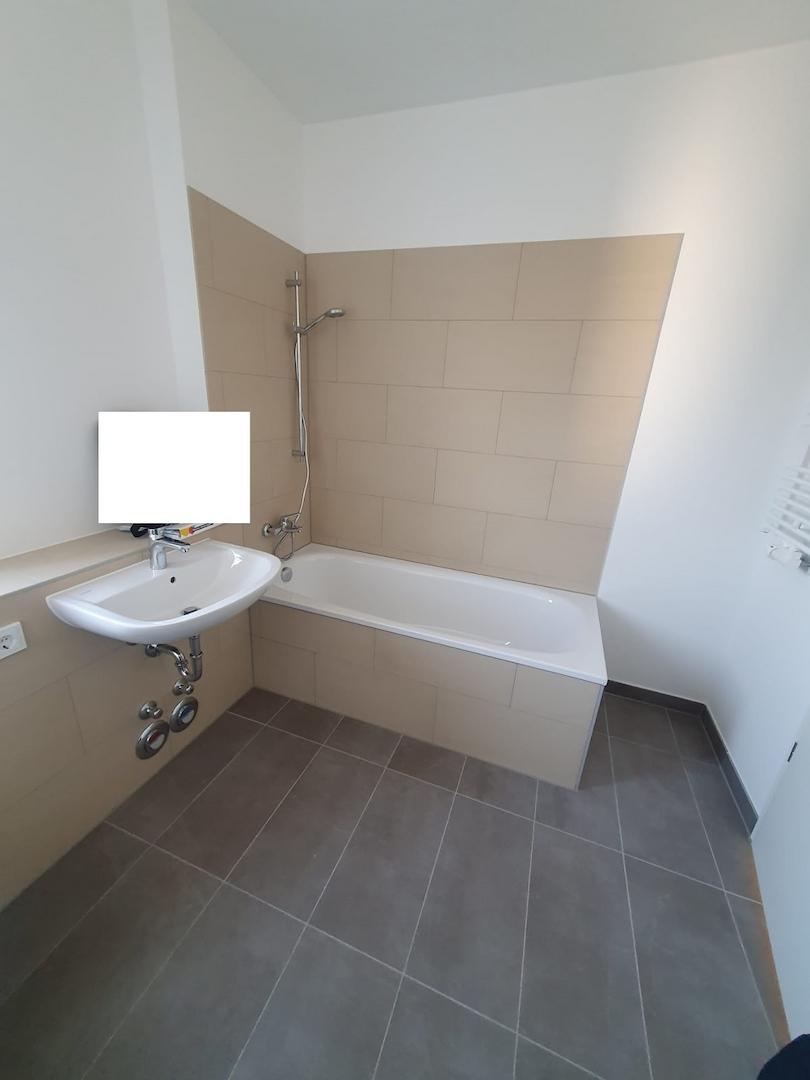 Badezimmer mit Waschmaschinenanschluss