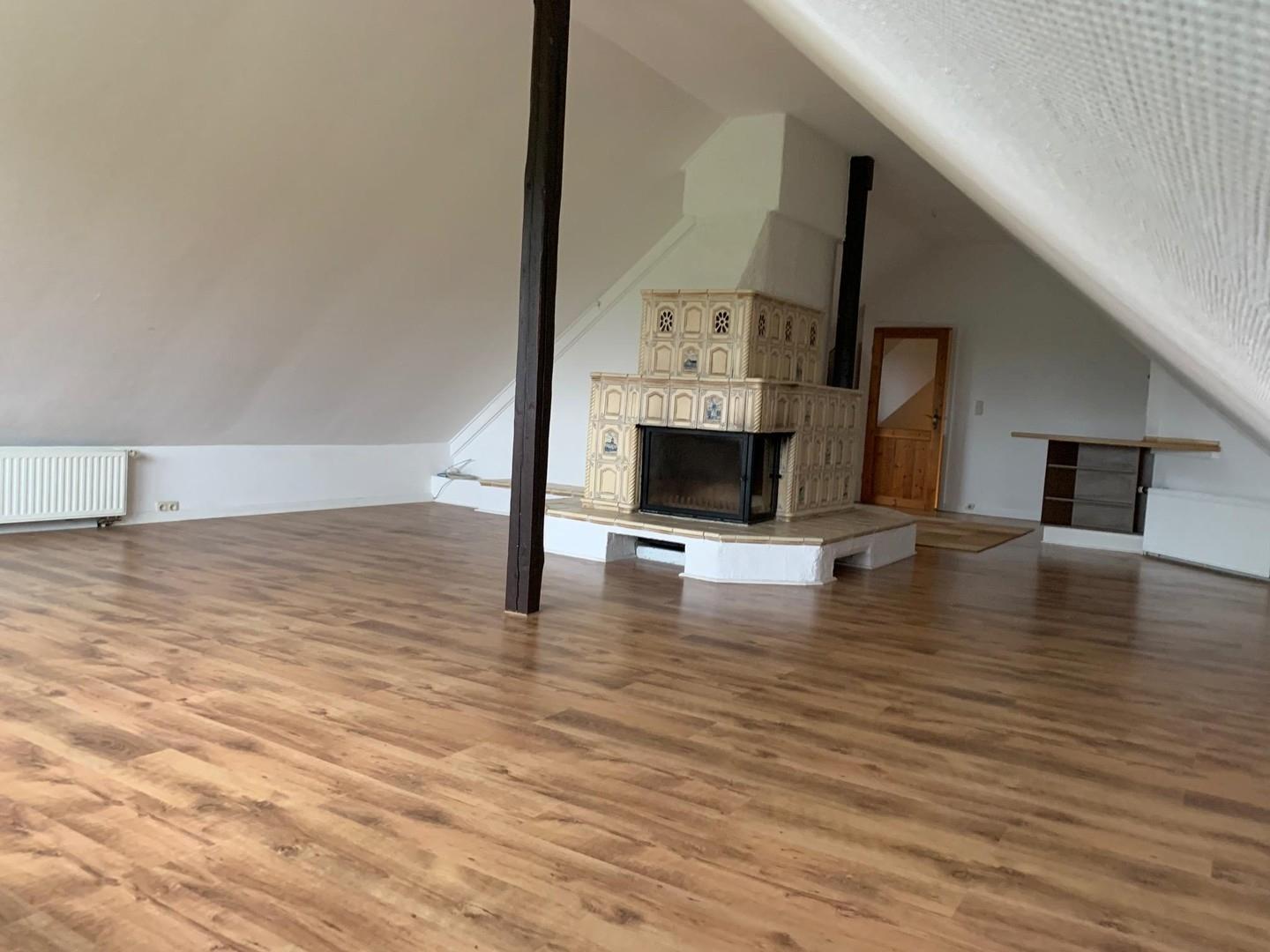 Wohnzimmer mit Kamin