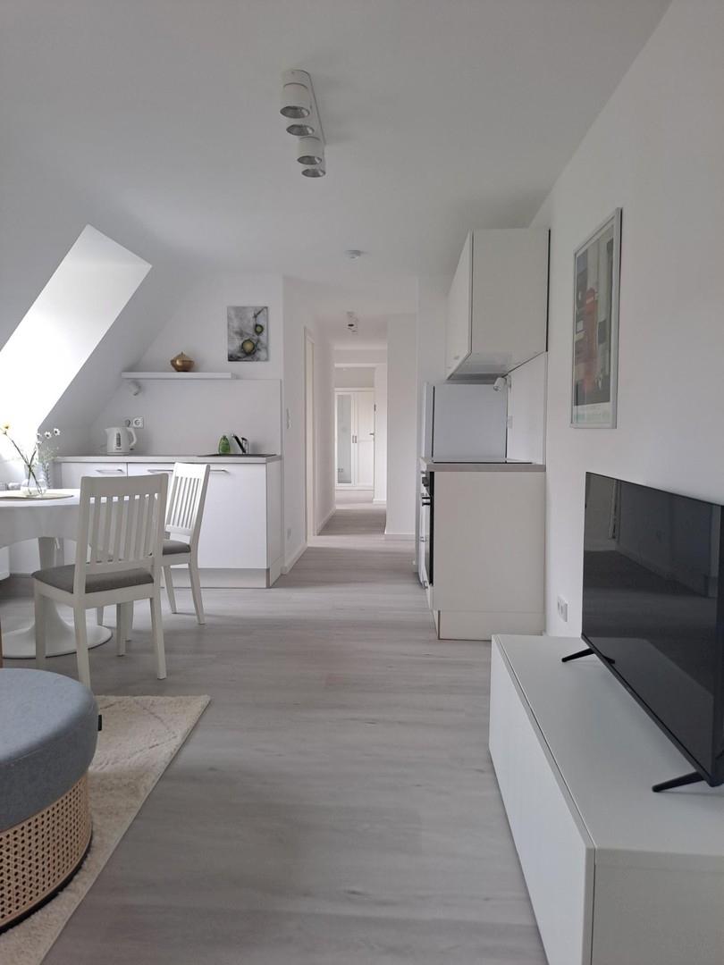 Wohnzimmer mit Küche