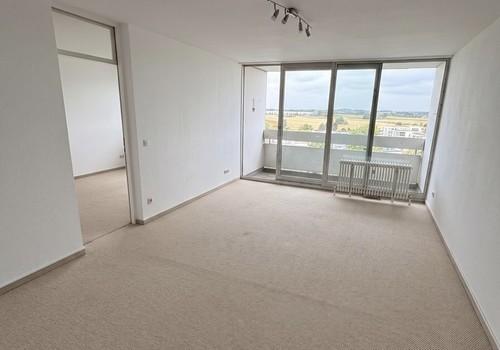 Wohnzimmer mit Balkon