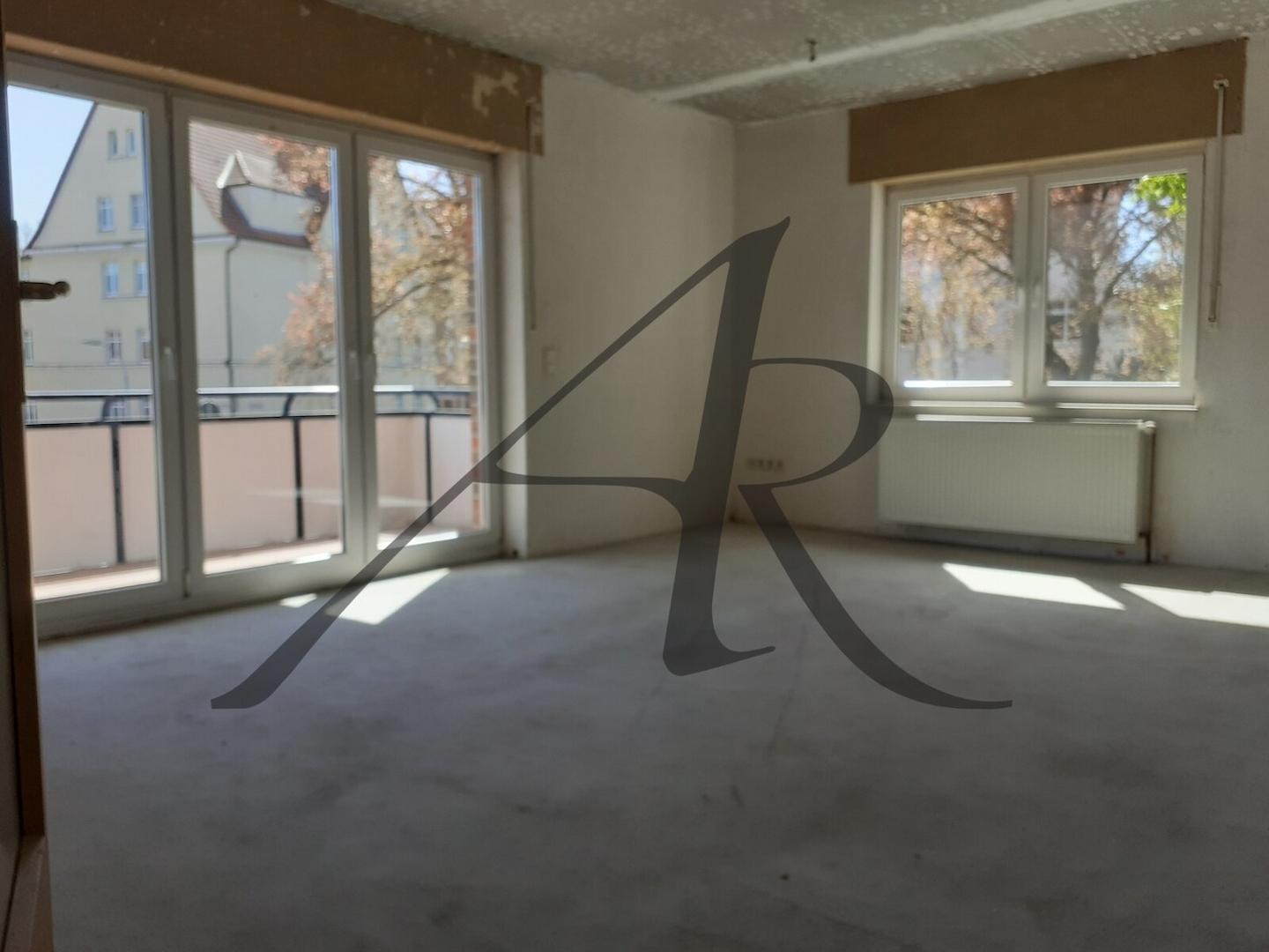 Wohnzimmer mit Balkon