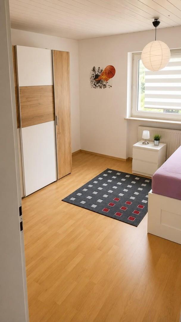 Kind 1/Schlafzimmer
