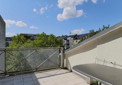Dachbalkon zum grünen Innenhof