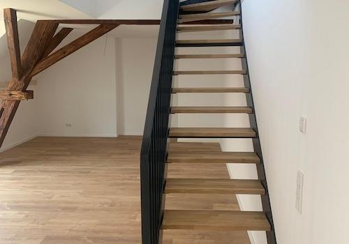 Treppe in das Obergeschoss