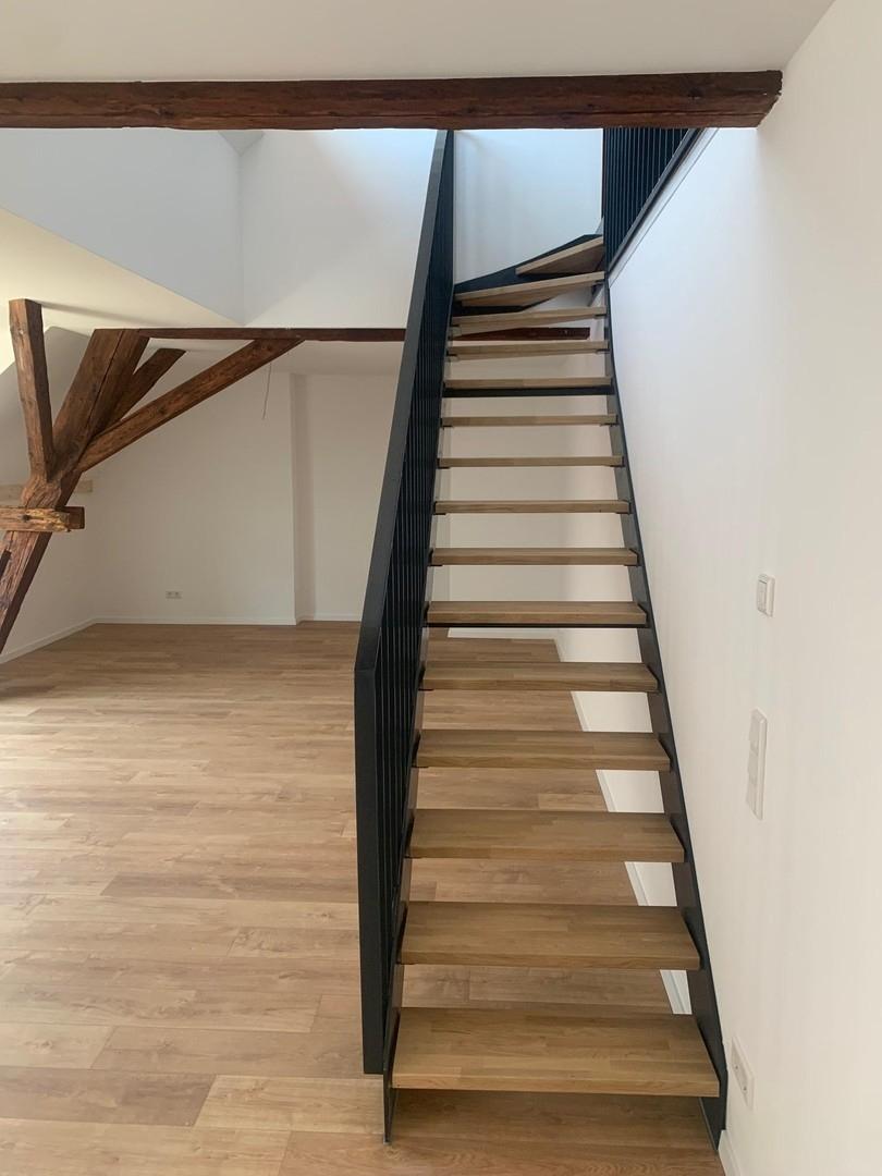 Treppe in das Obergeschoss