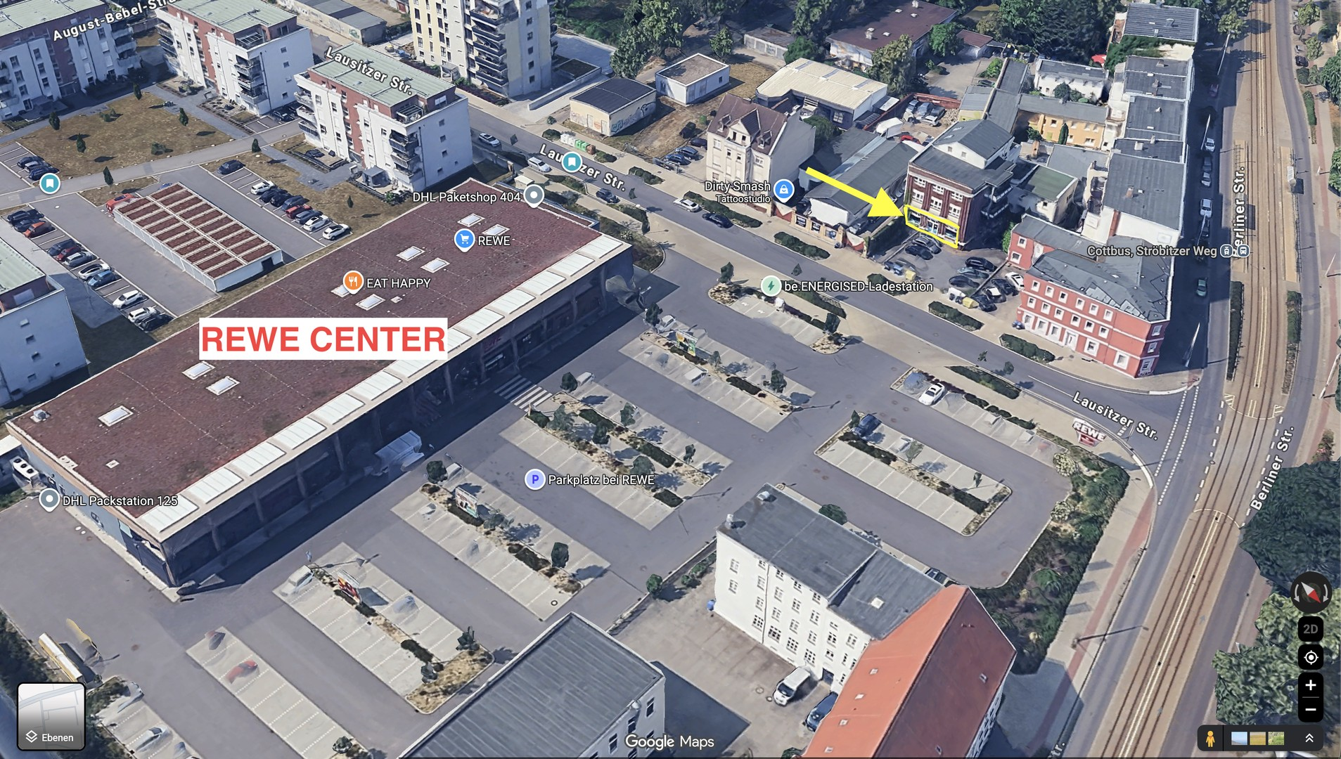Gegenüber vom REWE Center