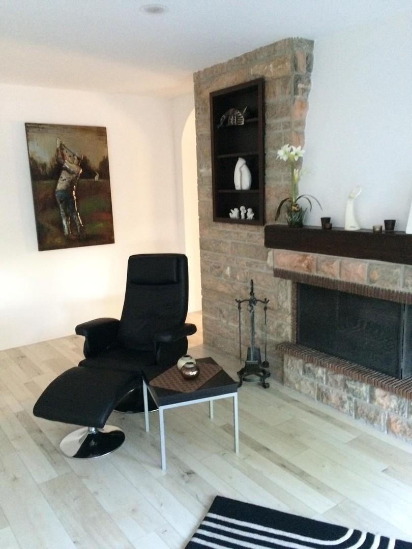 Kamin mit Schlafsessel