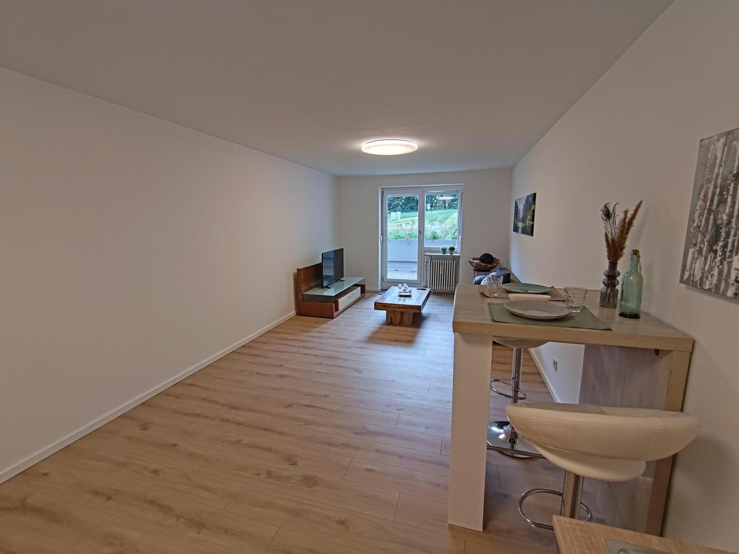 Küche + Wohnzimmer