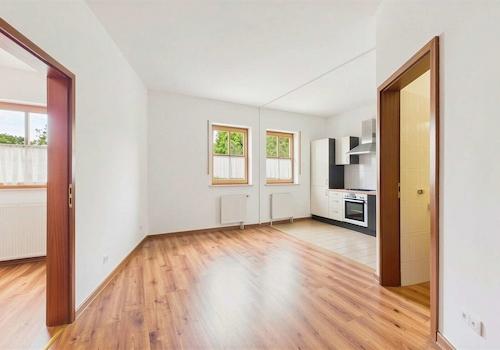 Wohnzimmer mit offener Küche - (KI generiert)