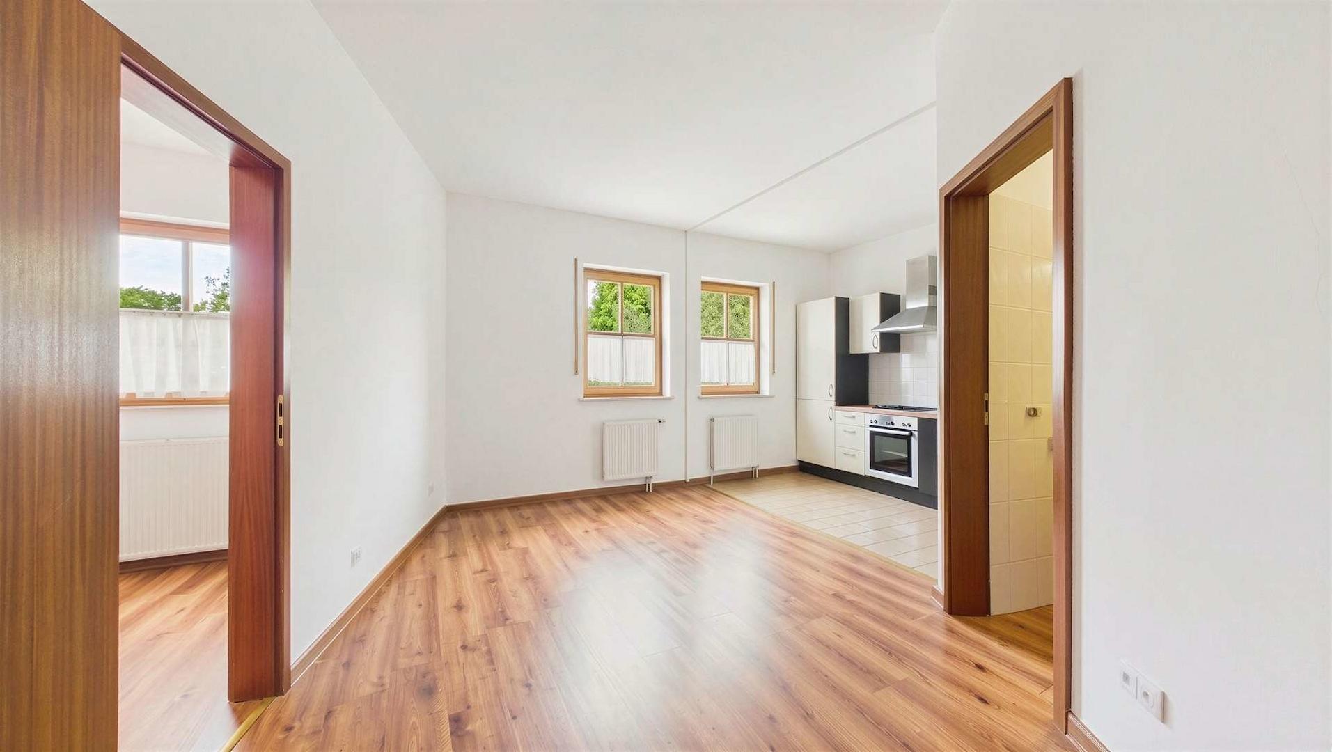 Wohnzimmer mit offener Küche - (KI generiert)
