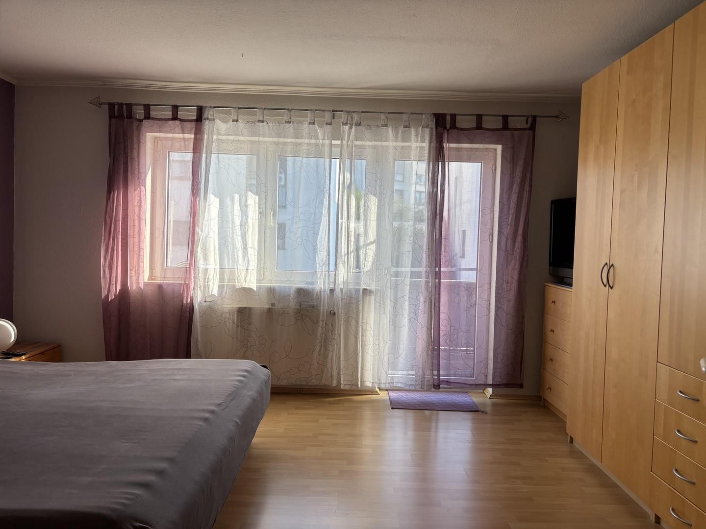 Schlafzimmer mit Balkon