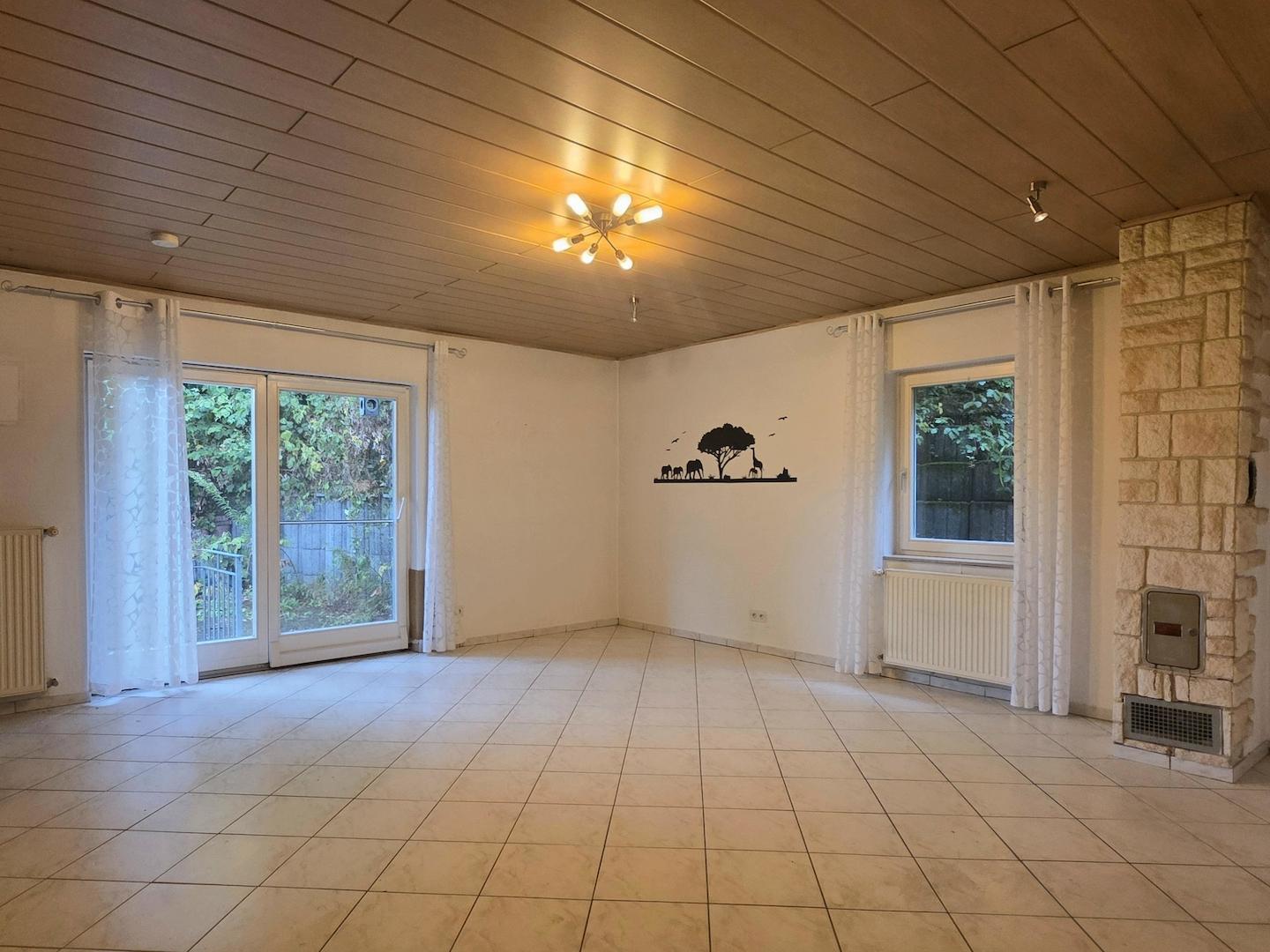Wohnzimmer mit Zugang Terrasse DG