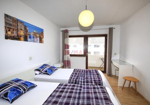 Schlafzimmer mit Balkon