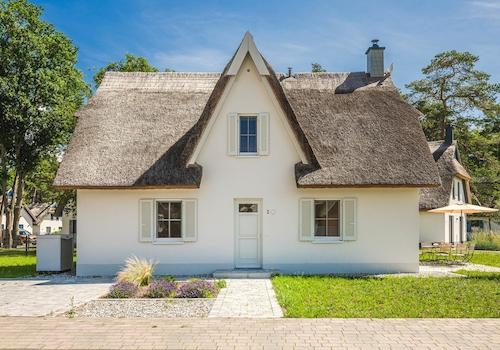 Frontansicht des Ferienhauses mit Spitzgaube ...
