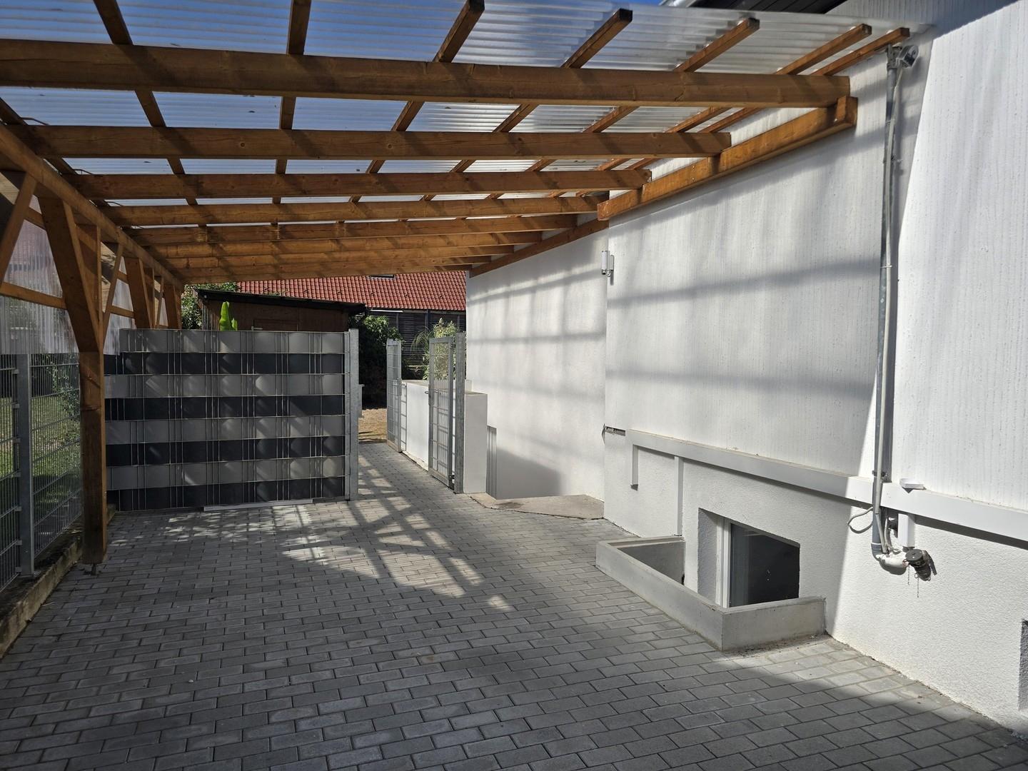 Einliegerwohnung Parkfläche