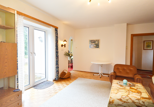 Ursprünglicher Zustand: Wohnzimmer mit angeschlossenem Esszimmer