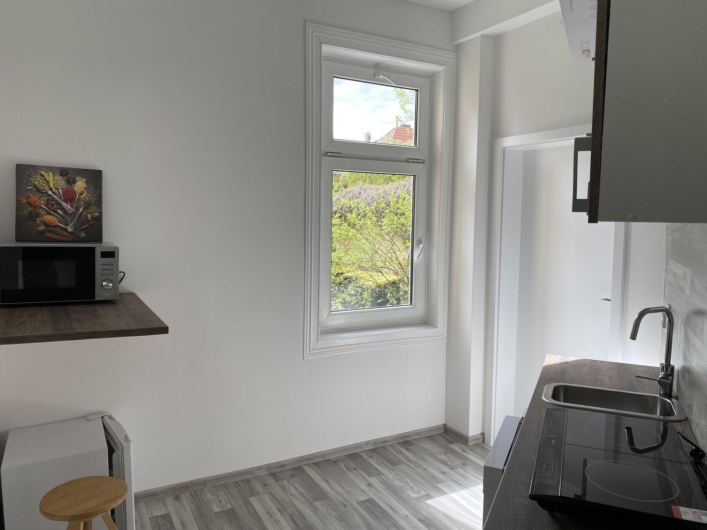 Küche Kühkschrank Mikrowelle..