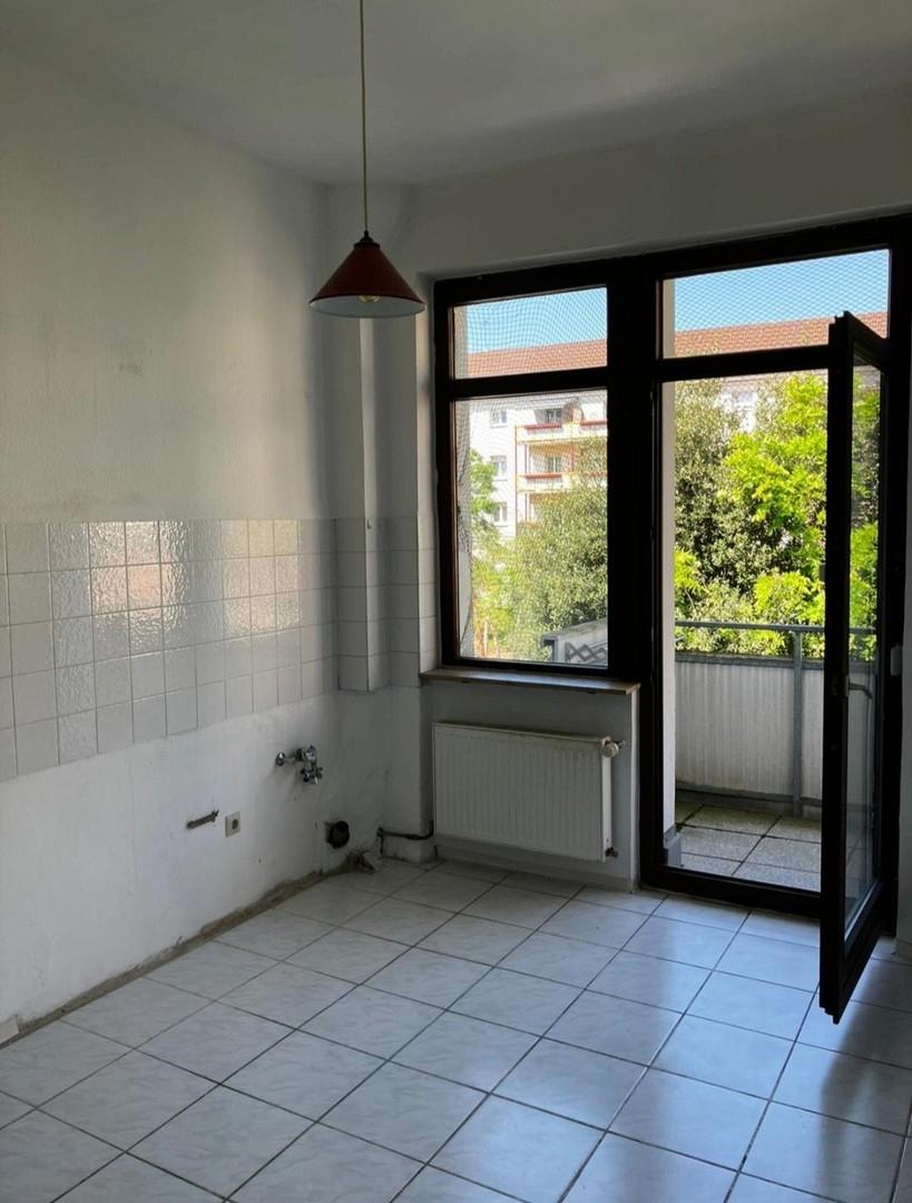 Wohnküche mit Balkon