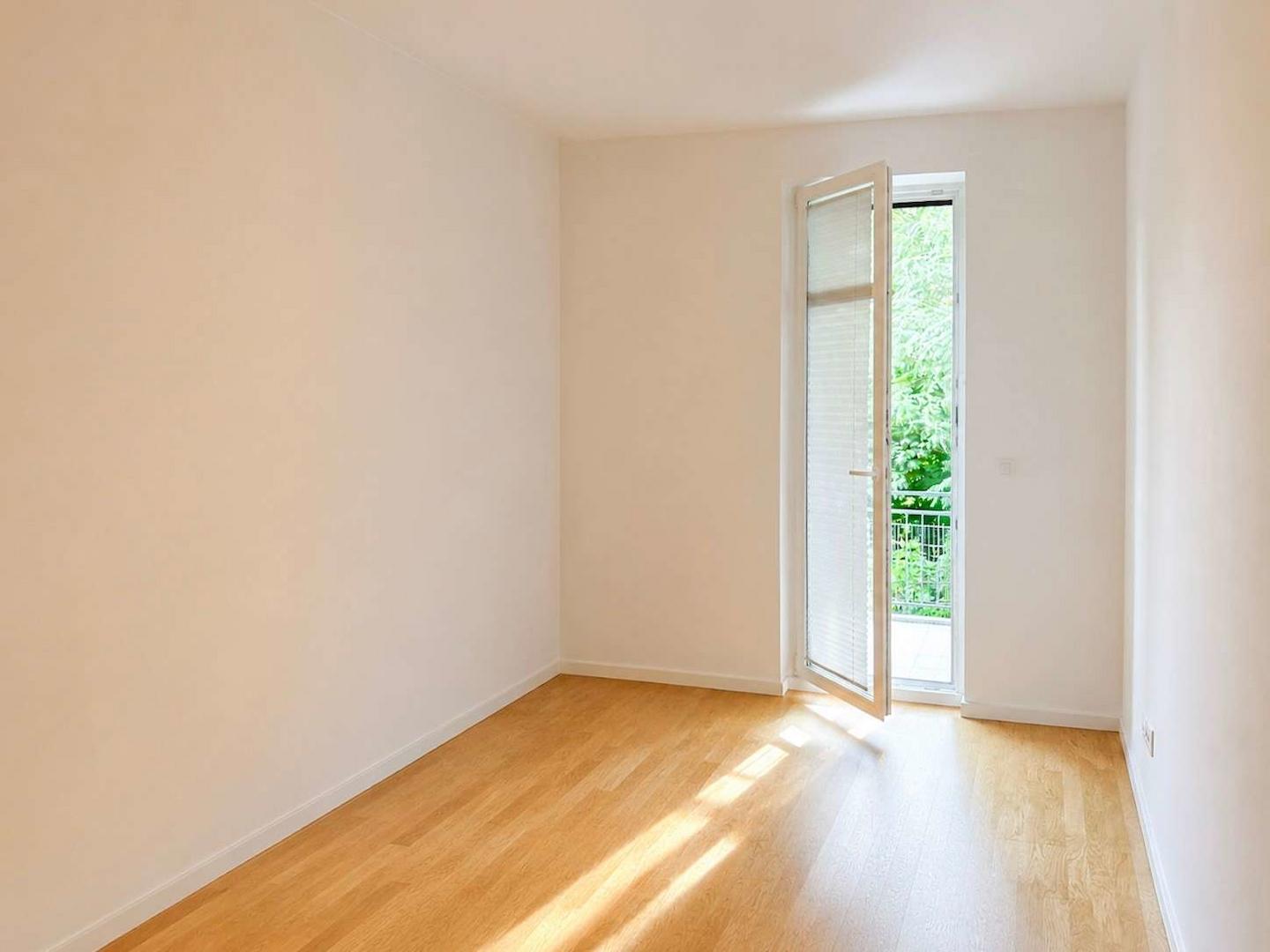 Schlafzimmer mit Balkonzugang