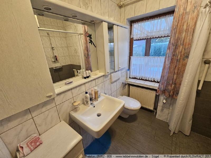 Badezimmer im Erdgeschoss - Bild I